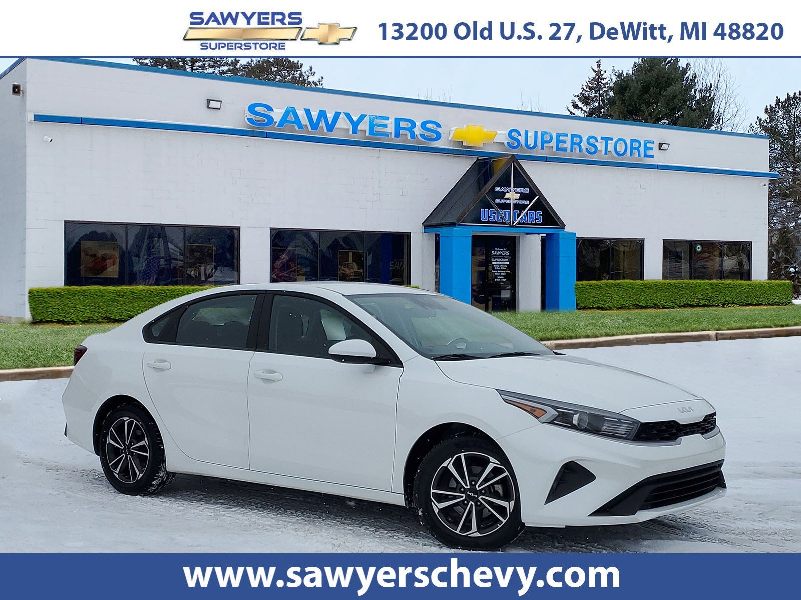 2023 Kia Forte LXS in Snow White Pearl — front three-quarter view